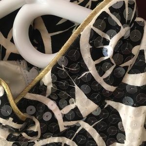 Beaded dress mini, gold trims.